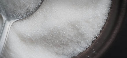 close up of granulated sugar in bowl